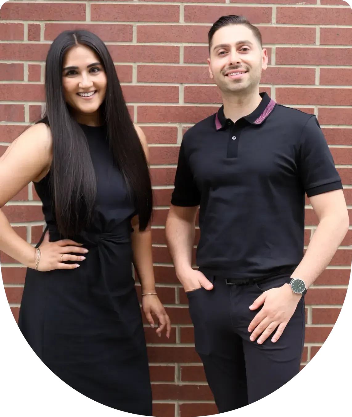 Dr. Safina Jetha-Kurji and Dr. Sami Sahawneh outside University District Dental